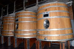 07-10 Three Large Wooden Wine Barrels On Our Wine Tour At Pulenta Estate Lujan de Cuyo Tour Near Mendoza.jpg